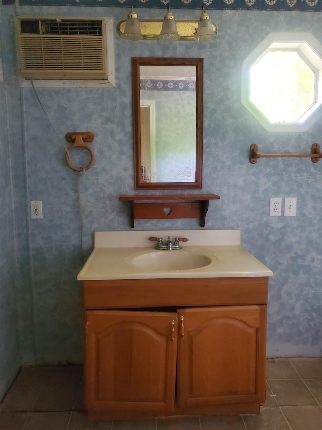 190 Beaverdam Church Rd, Enoree, SC 29335 - bathroom with tile patterned flooring, vanity, a wall mounted AC, and wallpapered walls