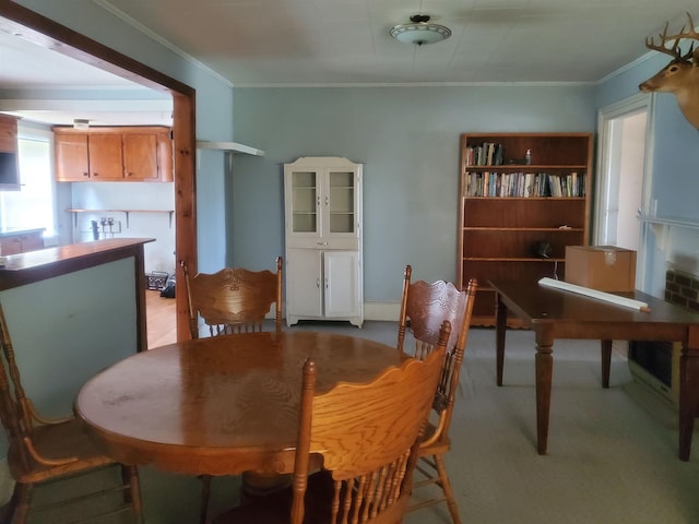190 Beaverdam Church Rd, Enoree, SC 29335 - dining area featuring ornamental molding and light carpet