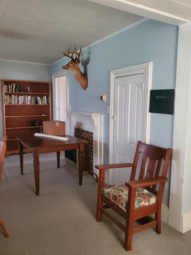 190 Beaverdam Church Rd, Enoree, SC 29335 - living area featuring crown molding, carpet, and a brick fireplace