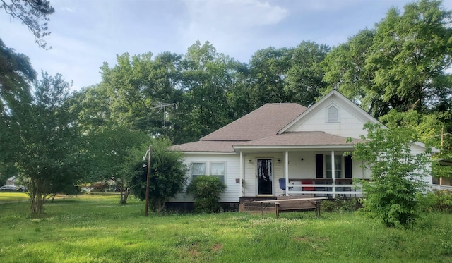 190 Beaverdam Church Rd, Enoree, SC 29335 - view of front of property featuring a porch, a front lawn, and a shingled roof