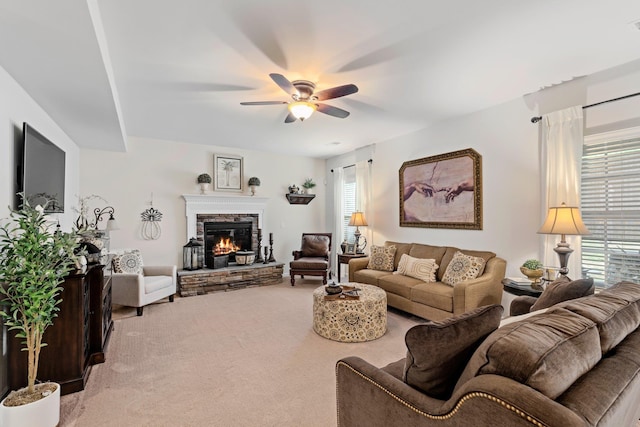 455 Shoreline Blvd, Boiling Springs, SC 29316 - living room featuring a ceiling fan, light carpet, and a stone fireplace