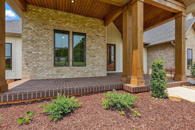 3963 Pennington Rd, Greer, SC 29651 - entrance to property featuring brick siding, roof with shingles, and covered porch