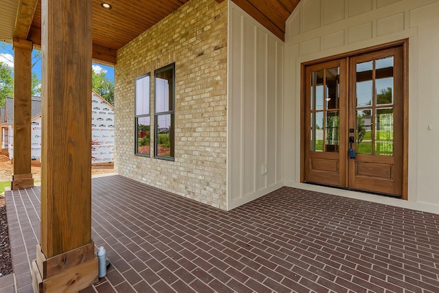 3963 Pennington Rd, Greer, SC 29651 - entrance to property with french doors, a porch, and brick siding