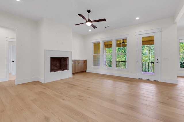 3963 Pennington Rd, Greer, SC 29651 - unfurnished living room with a fireplace, ceiling fan, light wood finished floors, and recessed lighting