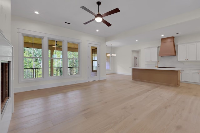 3963 Pennington Rd, Greer, SC 29651 - unfurnished living room featuring a ceiling fan, light wood-style flooring, and recessed lighting