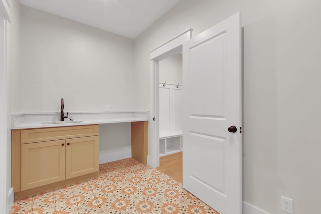 3963 Pennington Rd, Greer, SC 29651 - laundry area featuring a sink and baseboards
