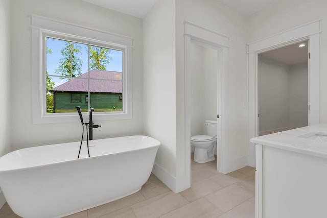 3963 Pennington Rd, Greer, SC 29651 - bathroom featuring a freestanding bath, vanity, and tile patterned floors