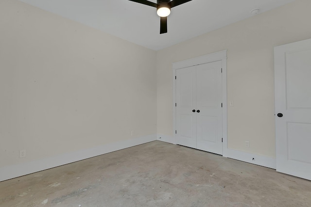 3963 Pennington Rd, Greer, SC 29651 - unfurnished bedroom with concrete floors, a closet, and ceiling fan