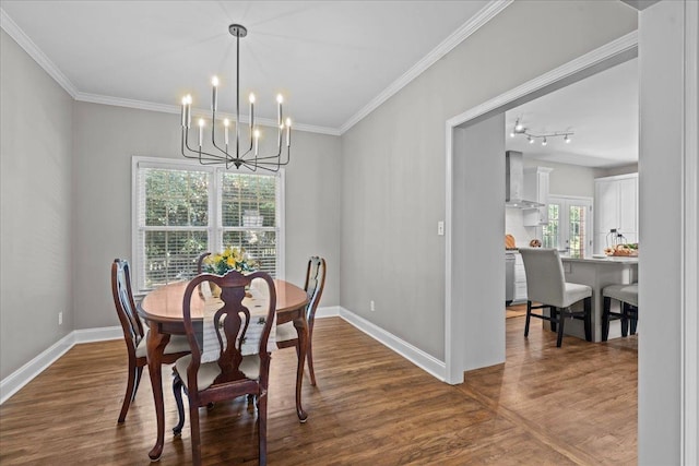 155 Lake Park Dr, Spartanburg, SC 29301 - dining area with a chandelier, dark wood finished floors, and ornamental molding