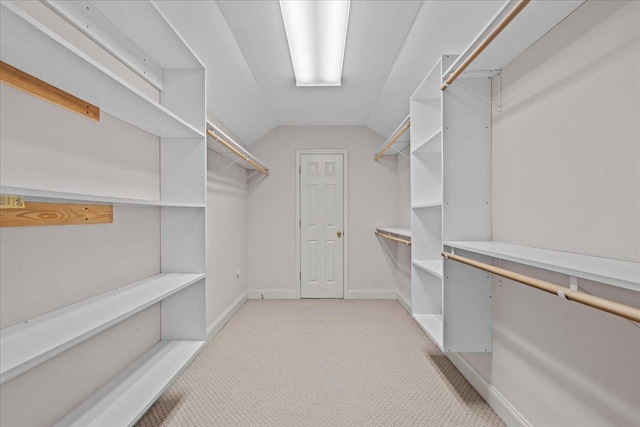 155 Lake Park Dr, Spartanburg, SC 29301 - walk in closet featuring light carpet and lofted ceiling