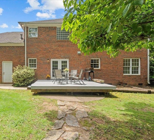155 Lake Park Dr, Spartanburg, SC 29301 - rear view of property featuring a deck, a yard, and brick siding