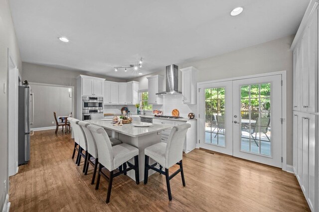 155 Lake Park Dr, Spartanburg, SC 29301 - dining area featuring healthy amount of natural light, wood finished floors, french doors, and recessed lighting