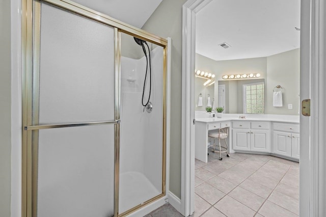 155 Lake Park Dr, Spartanburg, SC 29301 - bathroom featuring double vanity, a shower stall, and tile patterned flooring