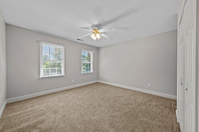 155 Lake Park Dr, Spartanburg, SC 29301 - spare room with carpet flooring and ceiling fan