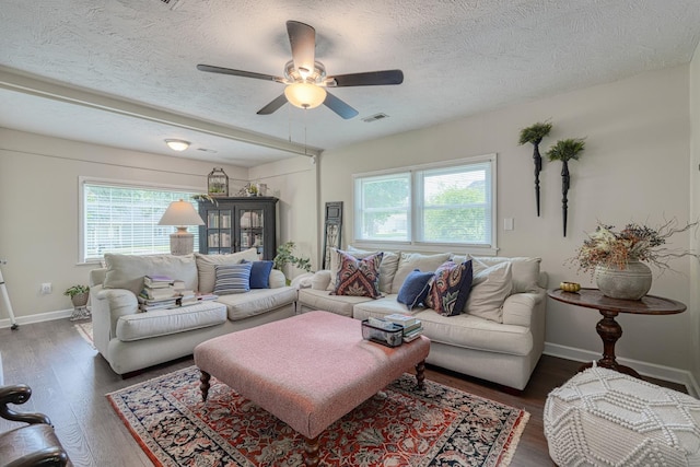 1762 New Cut Rd, Spartanburg, SC 29303 - living area with plenty of natural light, a ceiling fan, wood finished floors, and a textured ceiling