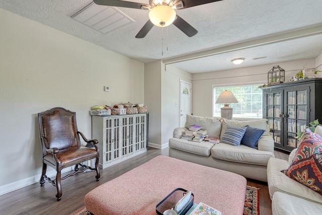1762 New Cut Rd, Spartanburg, SC 29303 - living room featuring wood finished floors, a textured ceiling, and a ceiling fan