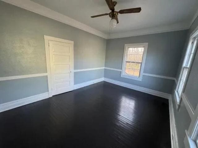 1145 Granite St, Pacolet, SC 29372 - unfurnished room with ceiling fan, dark wood-style floors, and crown molding