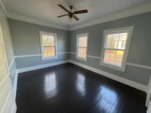 1145 Granite St, Pacolet, SC 29372 - unfurnished room featuring dark wood-type flooring, ceiling fan, and crown molding