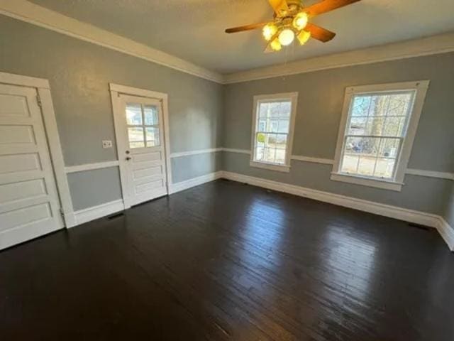 1145 Granite St, Pacolet, SC 29372 - spare room with ceiling fan, dark wood-type flooring, plenty of natural light, and ornamental molding