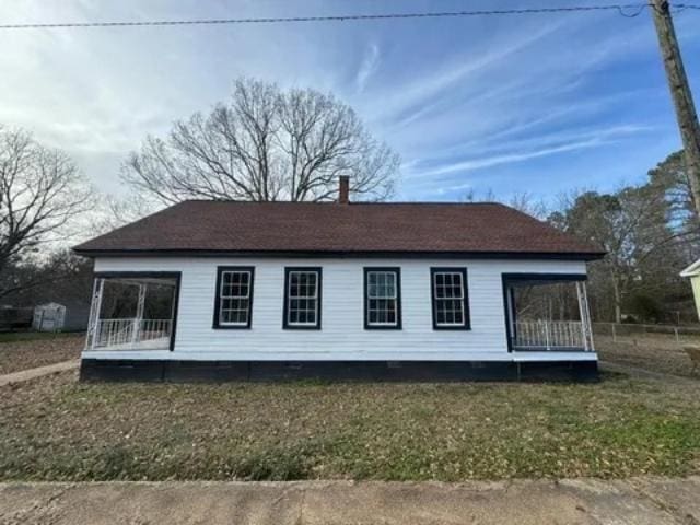 1145 Granite St, Pacolet, SC 29372 - view of side of home with a porch and a chimney
