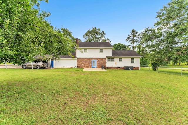 125 Greenway Ave, Union, SC 29379 - back of property featuring a chimney, brick siding, and a patio