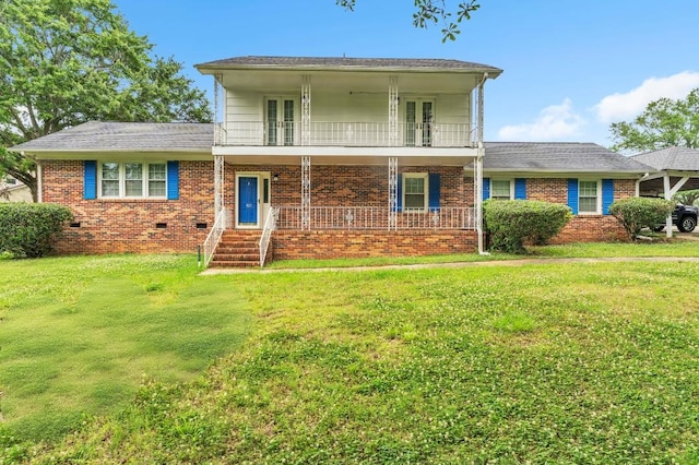125 Greenway Ave, Union, SC 29379 - view of front of home with french doors, a front yard, brick siding, and a porch
