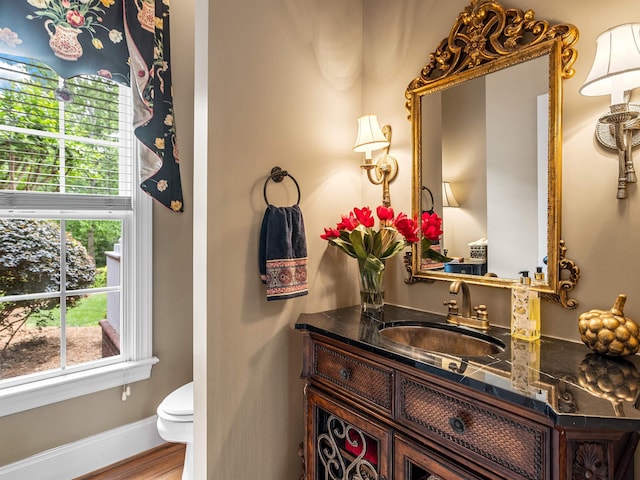 458 Carolina Club Dr, Spartanburg, SC 29306 - half bathroom featuring vanity and wood finished floors