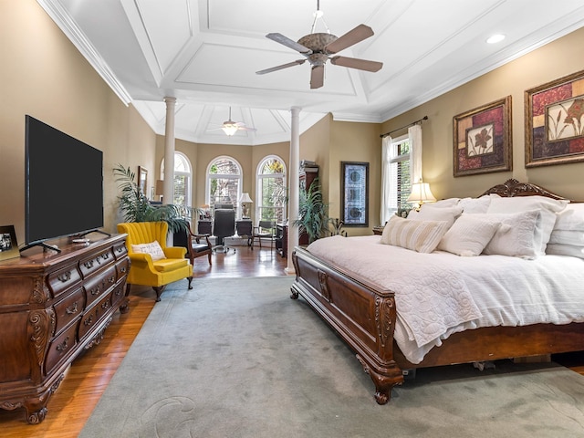 458 Carolina Club Dr, Spartanburg, SC 29306 - bedroom featuring ornate columns, multiple windows, crown molding, wood finished floors, and a ceiling fan