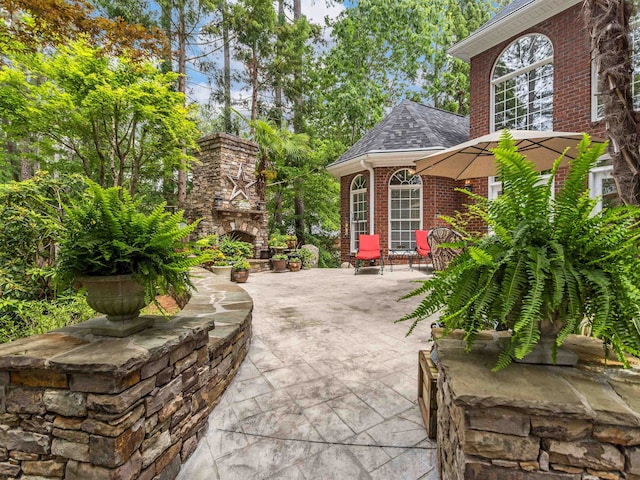 458 Carolina Club Dr, Spartanburg, SC 29306 - view of patio with an outdoor stone fireplace