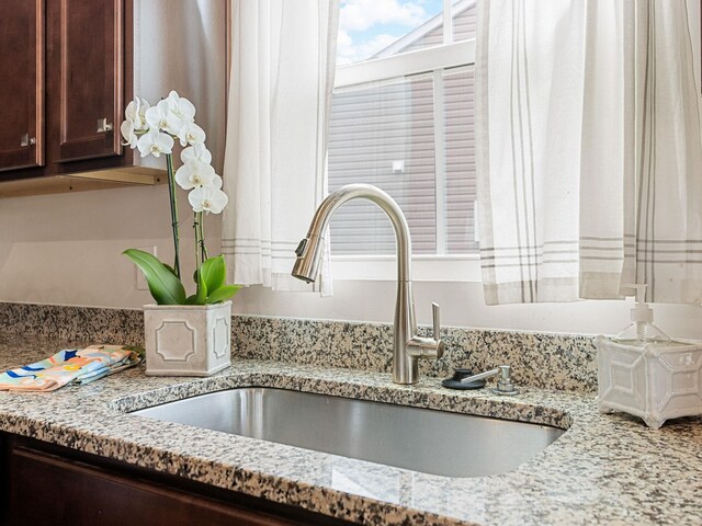 514 Olivia Springs Dr, Spartanburg, SC 29302 - detailed view of dark brown cabinets and light stone countertops