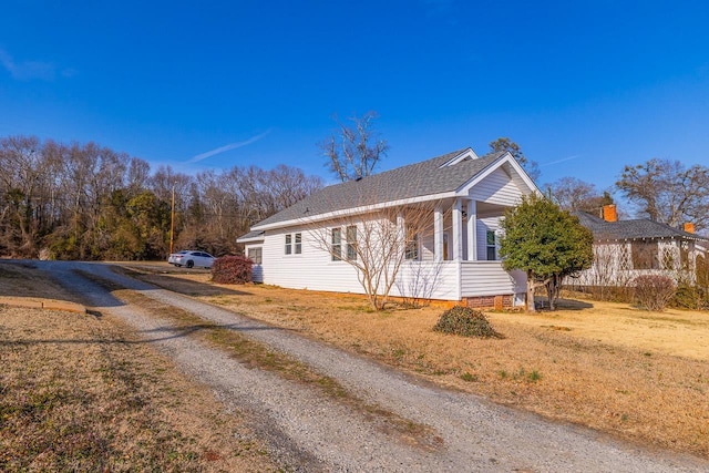 91 Lawrence St, Lyman, SC 29365 - view of home's exterior with driveway and a shingled roof