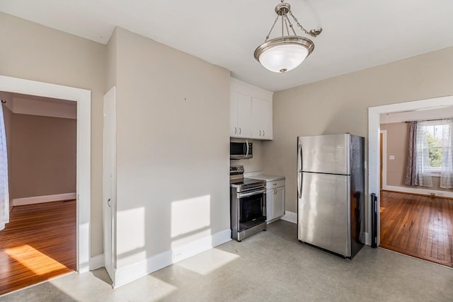 91 Lawrence St, Lyman, SC 29365 - kitchen featuring appliances with stainless steel finishes, white cabinetry, light countertops, and light wood-style floors