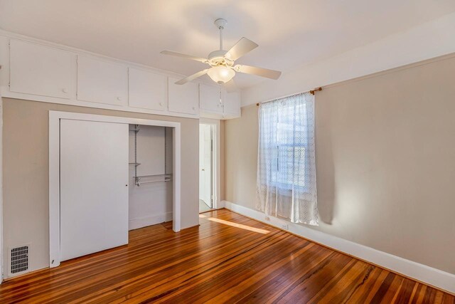 91 Lawrence St, Lyman, SC 29365 - unfurnished bedroom featuring hardwood / wood-style floors, a closet, and ceiling fan
