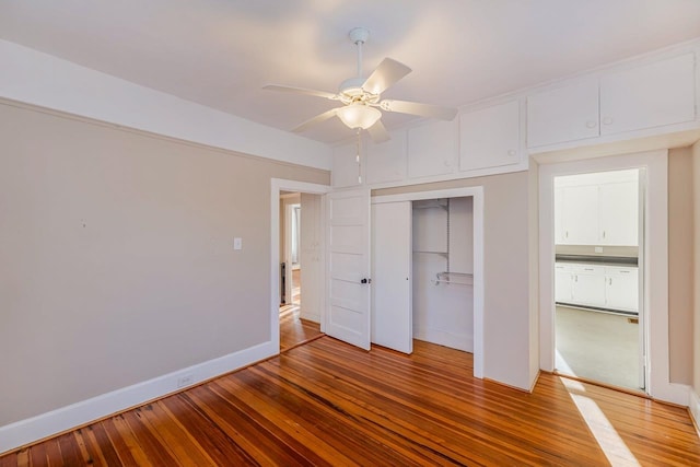 91 Lawrence St, Lyman, SC 29365 - unfurnished bedroom with hardwood / wood-style floors, a closet, and a ceiling fan