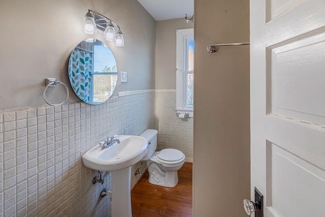91 Lawrence St, Lyman, SC 29365 - bathroom featuring tile walls, wood finished floors, and a wainscoted wall
