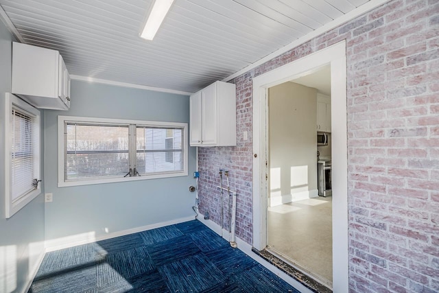 91 Lawrence St, Lyman, SC 29365 - washroom with brick wall and baseboards