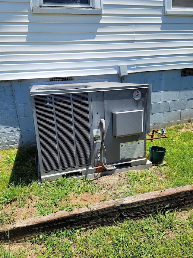 225 Limestone St, Pacolet, SC 29372 - exterior view of a central AC unit and crawl space
