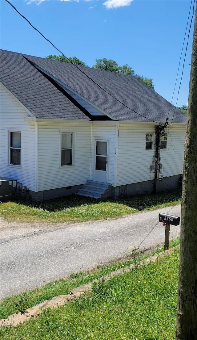 225 Limestone St, Pacolet, SC 29372 - view of side of home featuring a shingled roof and crawl space