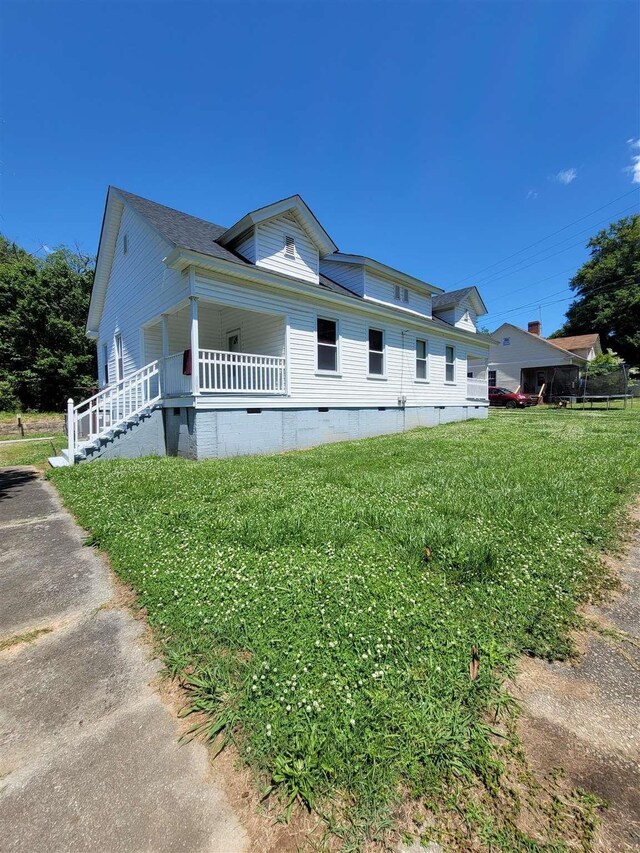 225 Limestone St, Pacolet, SC 29372 - view of side of property with crawl space, covered porch, and a yard