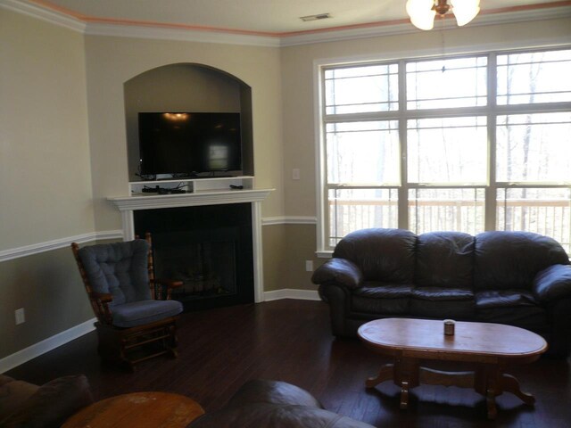 415 Abernathy Rd, Inman, SC 29349 - living room featuring wood finished floors, a fireplace, plenty of natural light, ornamental molding, and ceiling fan