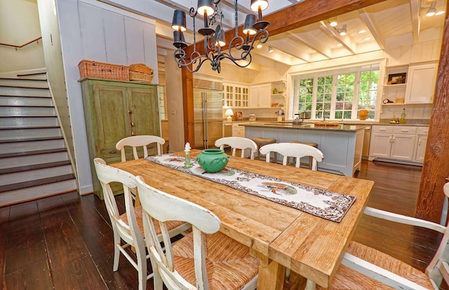 735 Jackson Grove Rd, Landrum, SC 29356 - dining space featuring stairway, dark wood finished floors, beamed ceiling, and a chandelier