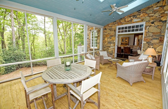 735 Jackson Grove Rd, Landrum, SC 29356 - sunroom / solarium with a ceiling fan, vaulted ceiling, a skylight, and outdoor dining area