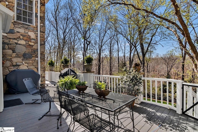 735 Jackson Grove Rd, Landrum, SC 29356 - wooden terrace with outdoor dining space and area for grilling