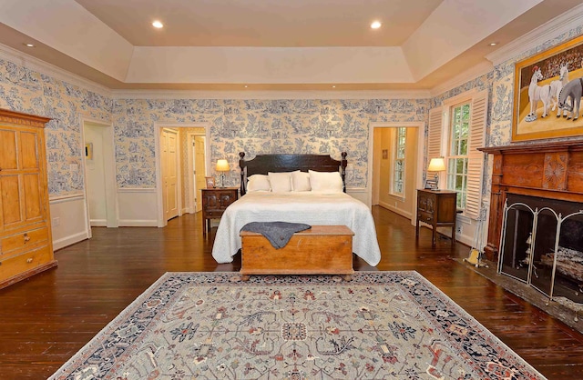 735 Jackson Grove Rd, Landrum, SC 29356 - bedroom featuring a fireplace, a tray ceiling, hardwood / wood-style floors, crown molding, and wallpapered walls