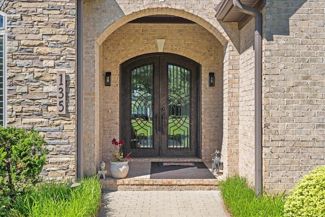 135 Neal Pointe Dr, Chesnee, SC 29323 - property entrance featuring french doors and brick siding