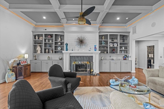 135 Neal Pointe Dr, Chesnee, SC 29323 - living area featuring ornamental molding, a premium fireplace, coffered ceiling, beam ceiling, and light wood-style floors