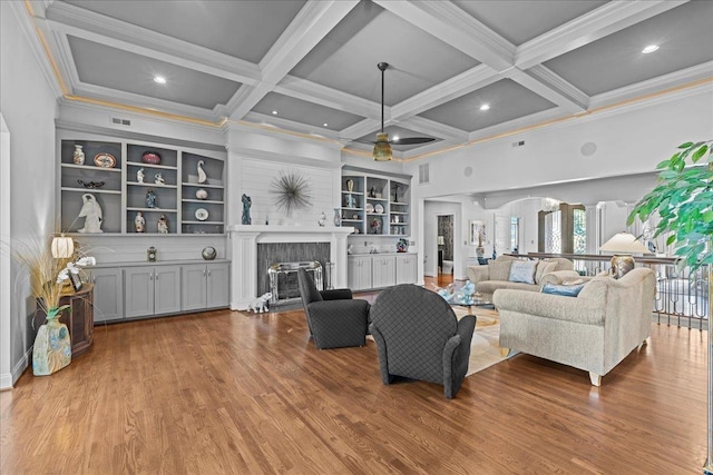 135 Neal Pointe Dr, Chesnee, SC 29323 - living area featuring a fireplace, wood finished floors, ornamental molding, beamed ceiling, and coffered ceiling