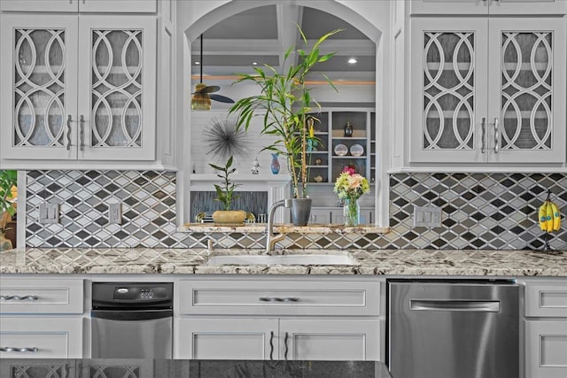 135 Neal Pointe Dr, Chesnee, SC 29323 - kitchen featuring stainless steel dishwasher, glass insert cabinets, white cabinetry, and light stone countertops