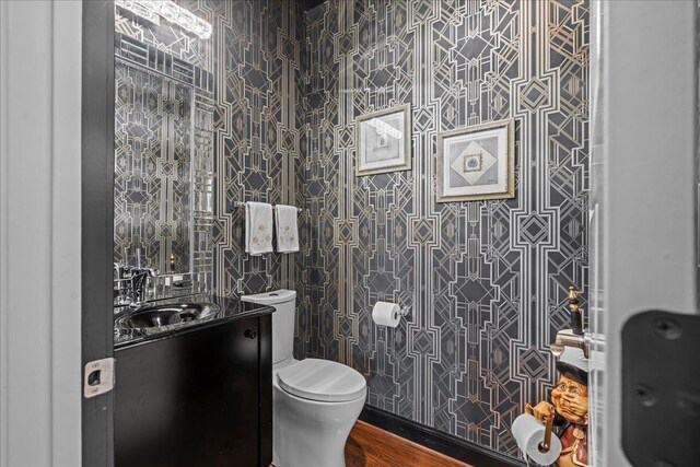 135 Neal Pointe Dr, Chesnee, SC 29323 - half bathroom featuring vanity, wood finished floors, and tile walls