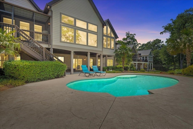135 Neal Pointe Dr, Chesnee, SC 29323 - pool at dusk with a patio area and stairs